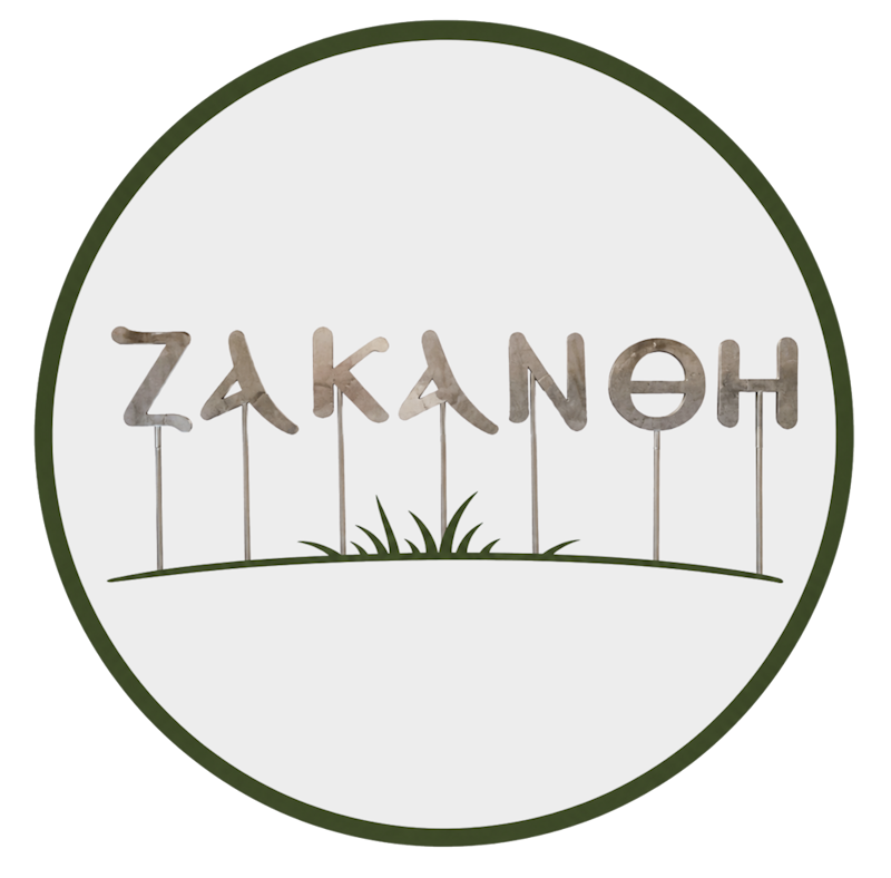 Zakanthi Restaurant logo — handcrafted metal lettering on a green circular badge, Kalamaki Zakynthos